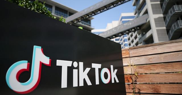 TikTok logo in front of a building.